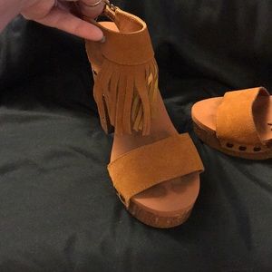 Brown fringe suede shoes